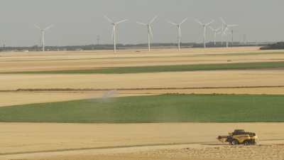 Wind Turbine and harvest in the Beauce region